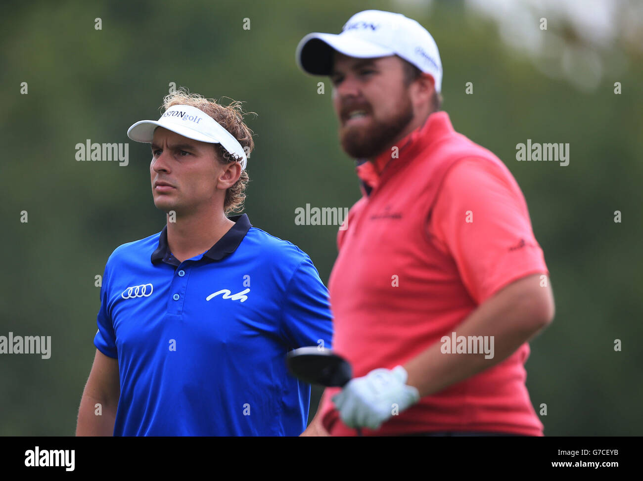Holland's Joost Luiten on the 14th tee with Ireland's Shane Lowry (right) during day three of the 2014 ISPS Handa Welsh Open at Celtic Manor, Newport. Stock Photo