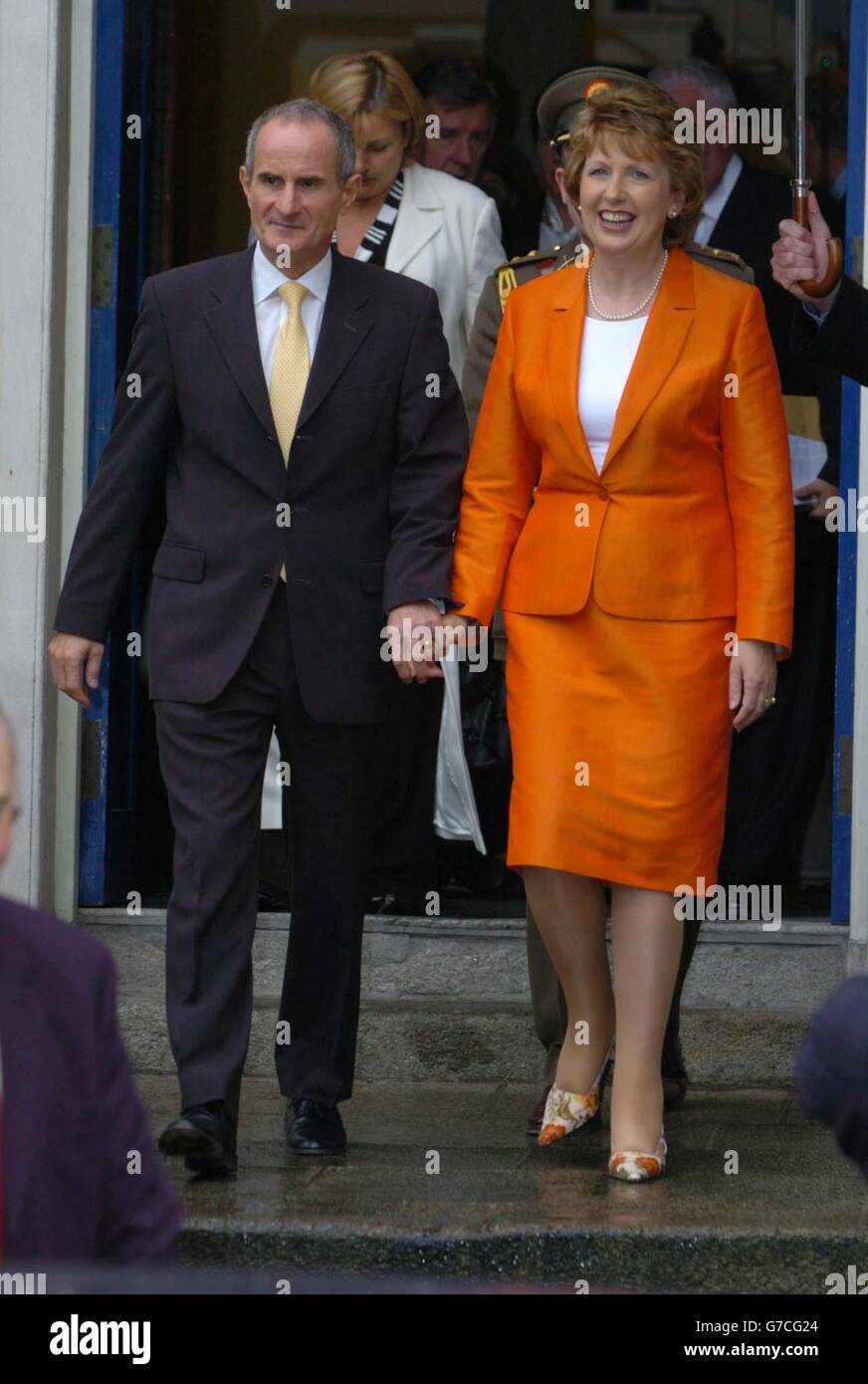 President Mary McAleese with her husband Dr Martin McAleese, as she leaves the Customs House in Dublin, after being returned unopposed as President of Ireland for a second seven year term. Stock Photo