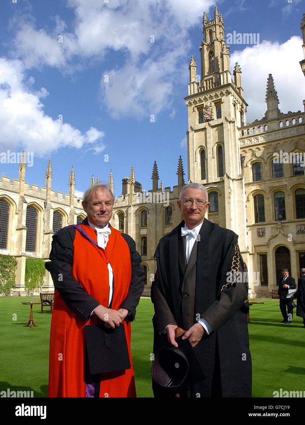 The new Vice-Chancellor of Oxford University Dr John Hood (right) and the outgoing Vice-Chancellor Sir Colin Lucas lead the procession, from Old Clarendon Building to the University Church of St Mary the Virgin for the admission ceremony in front of the varsity's 'parliament of dons'. A former adviser to the New Zealand cricket squad, Dr Hood is the 270th individual and the first outside candidate to hold the post. Stock Photo