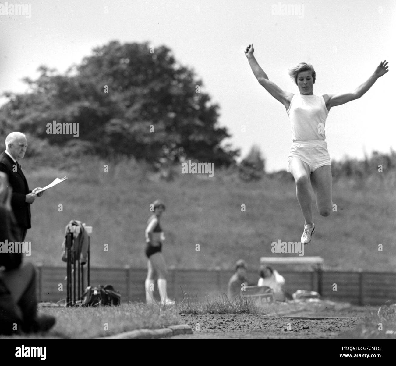 Mary Rand in action in the long jump. Stock Photo