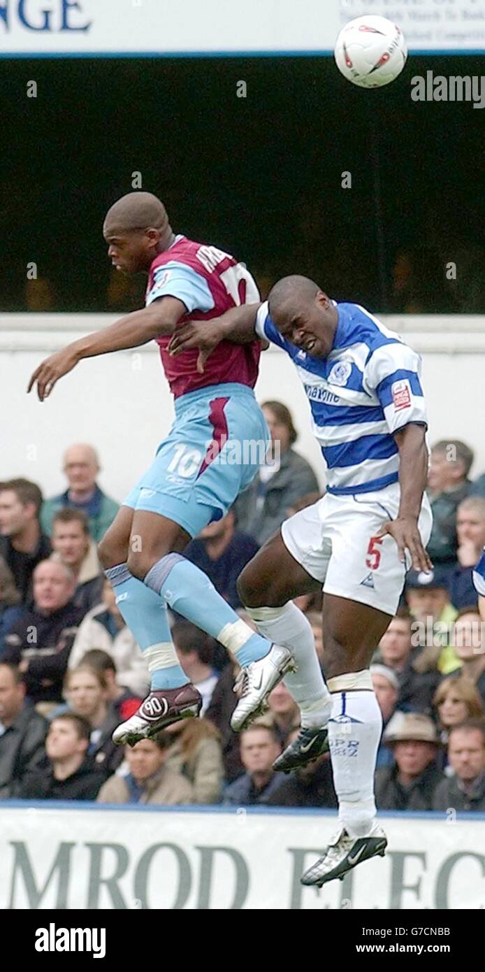 Queen's Park Rangers Daniel Shittu, right, and West Ham's Marlon Harewood battle for the ball during their Coca-Cola Championship match at Loftus Road, west London, Saturday October 16, 2004. NO UNOFFICIAL CLUB WEBSITE USE. Stock Photo