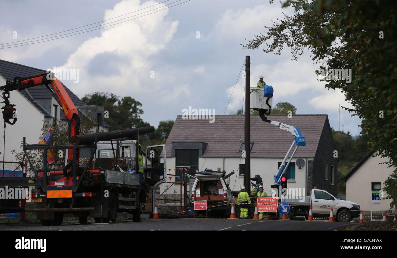 Northern Ireland Electricity repair crews work to restore power