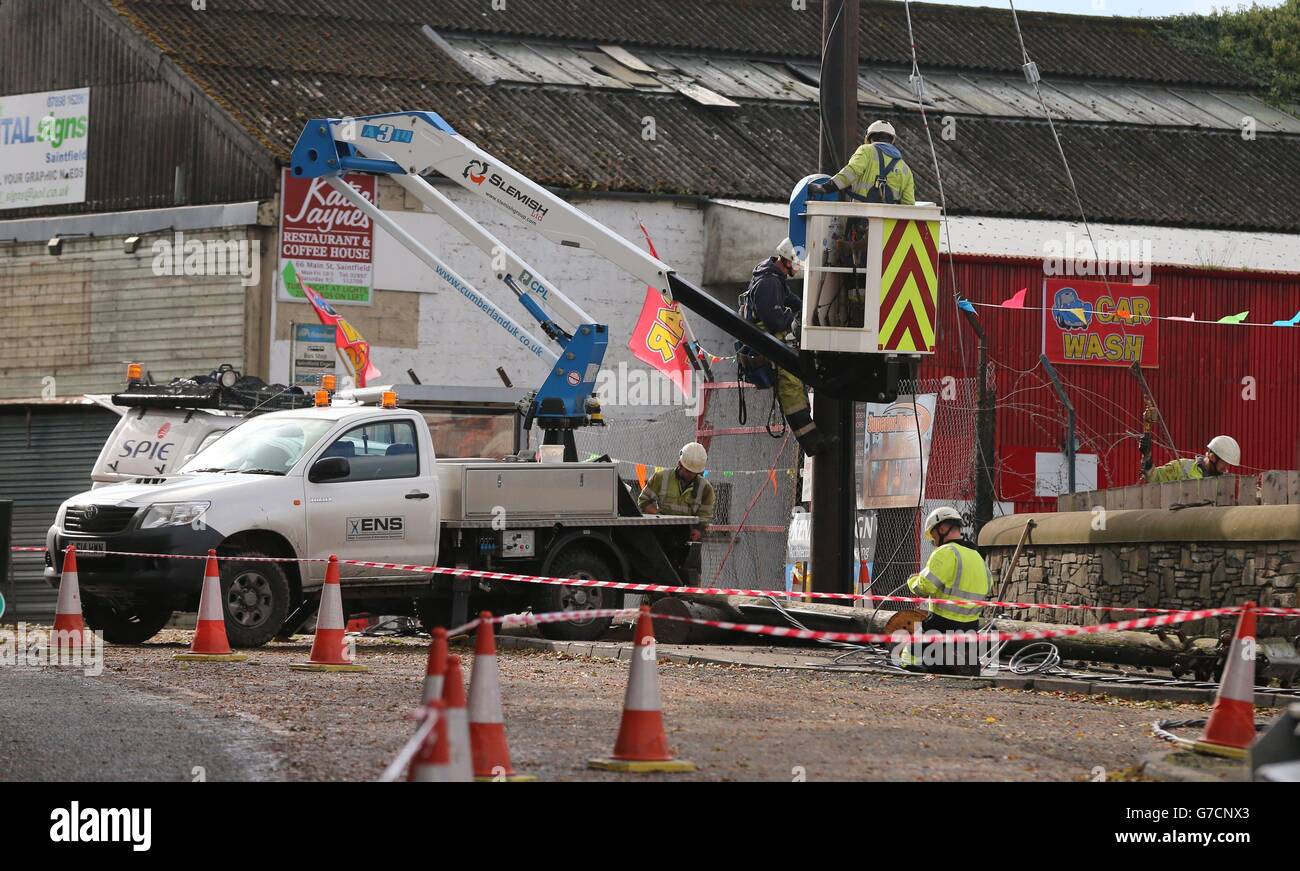 Northern Ireland Electricity repair crews work to restore power