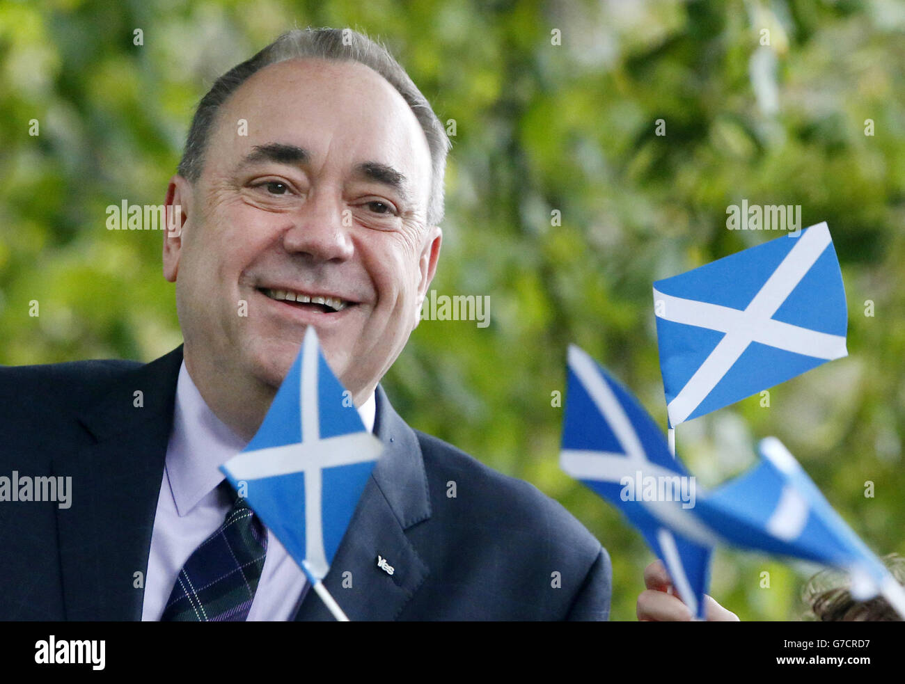 First Minister of Scotland Alex Salmond chats to school children at Strichen Primary School in Strichen, as polls have opened on a historic day for Scotland as voters determine whether the country should remain part of the United Kingdom. Stock Photo
