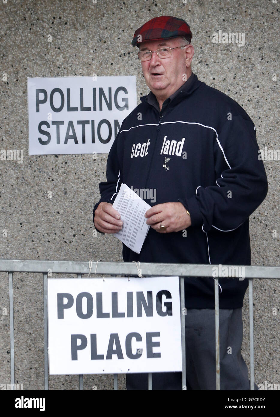 A voter arrives outside Ritchie Hall polling station in Strichen as polls have opened on a historic day for Scotland as voters determine whether the country should remain part of the United Kingdom. Stock Photo