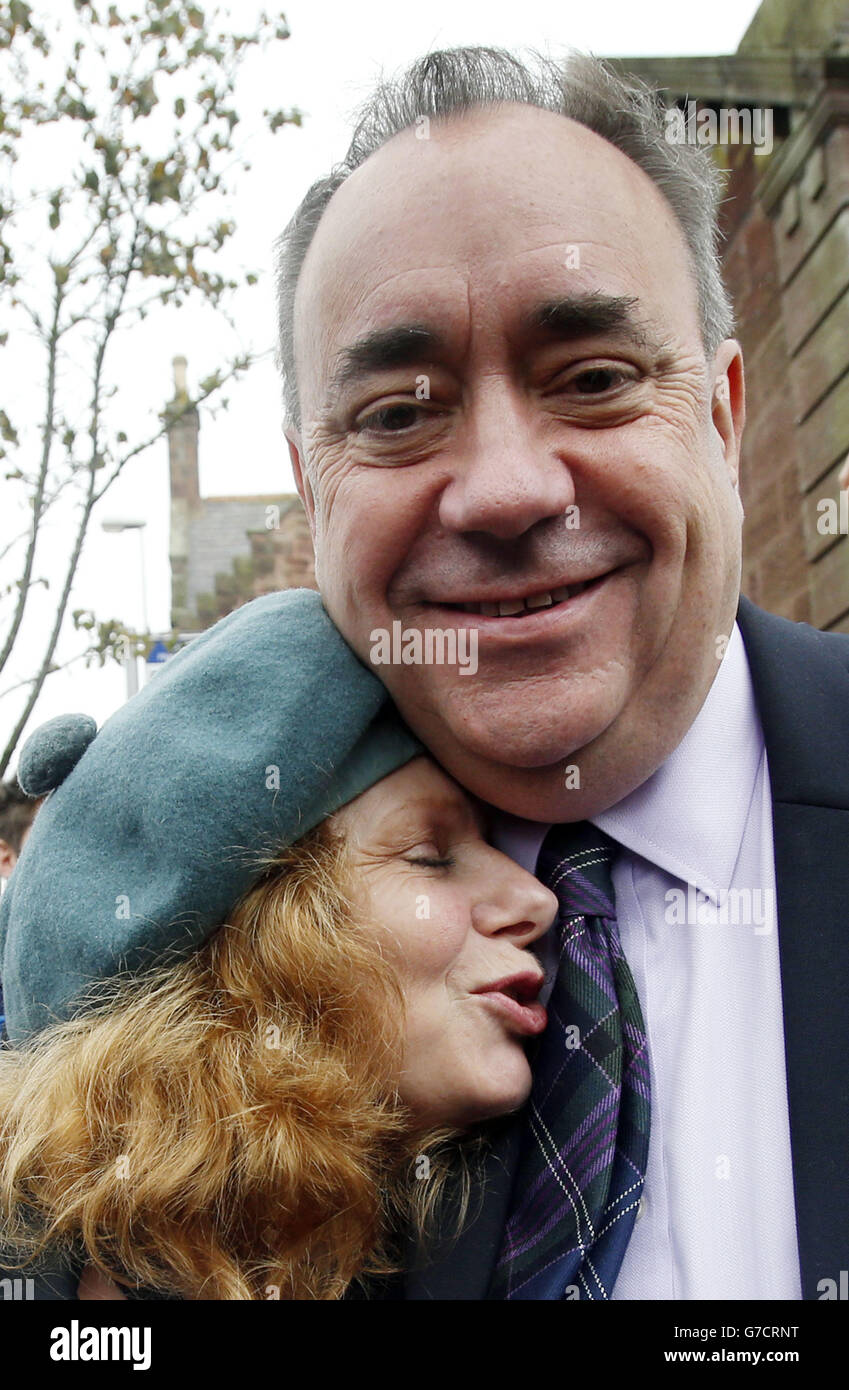 Scottish First Minister Alex Salmond with a Yes supporter in Turriff during a historic day for Scotland as voters determine whether the country should remain part of the United Kingdom. Stock Photo