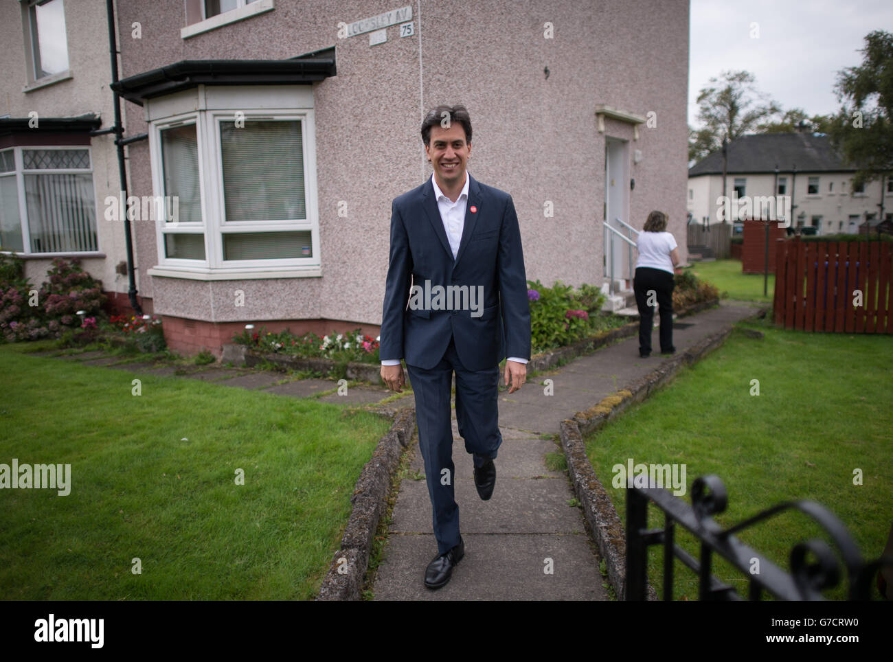 Labour leader Ed Miliband canvasses voters in the Knightswood area of Glasgow during a historic day for Scotland as voters determine whether the country should remain part of the United Kingdom. Stock Photo