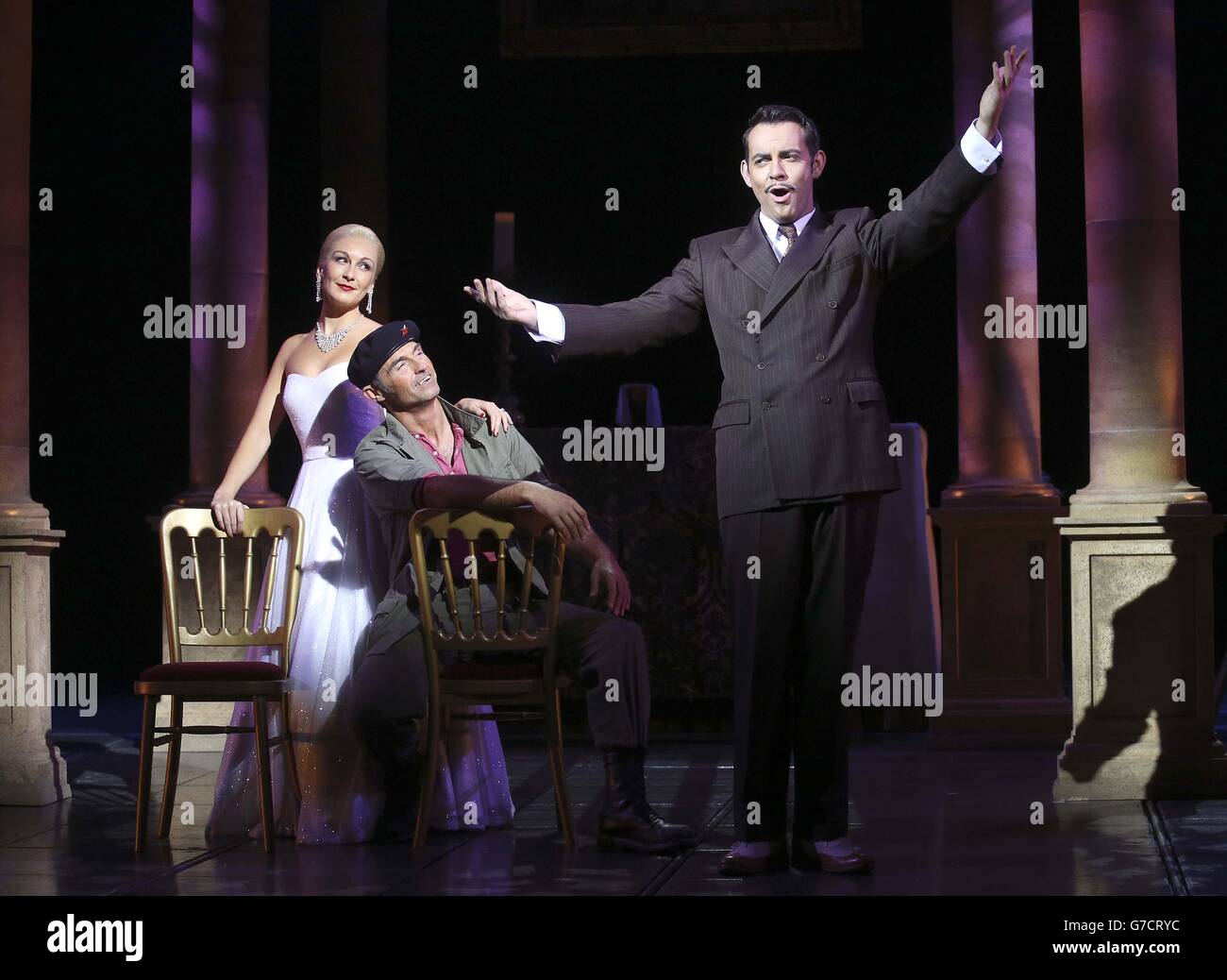 (left to right) Madalena Alberto as Eva, Marti Pellow as Che and Ben Forster as Agustin Magaldi performing in Evita at the Dominion Theatre in central London. Stock Photo