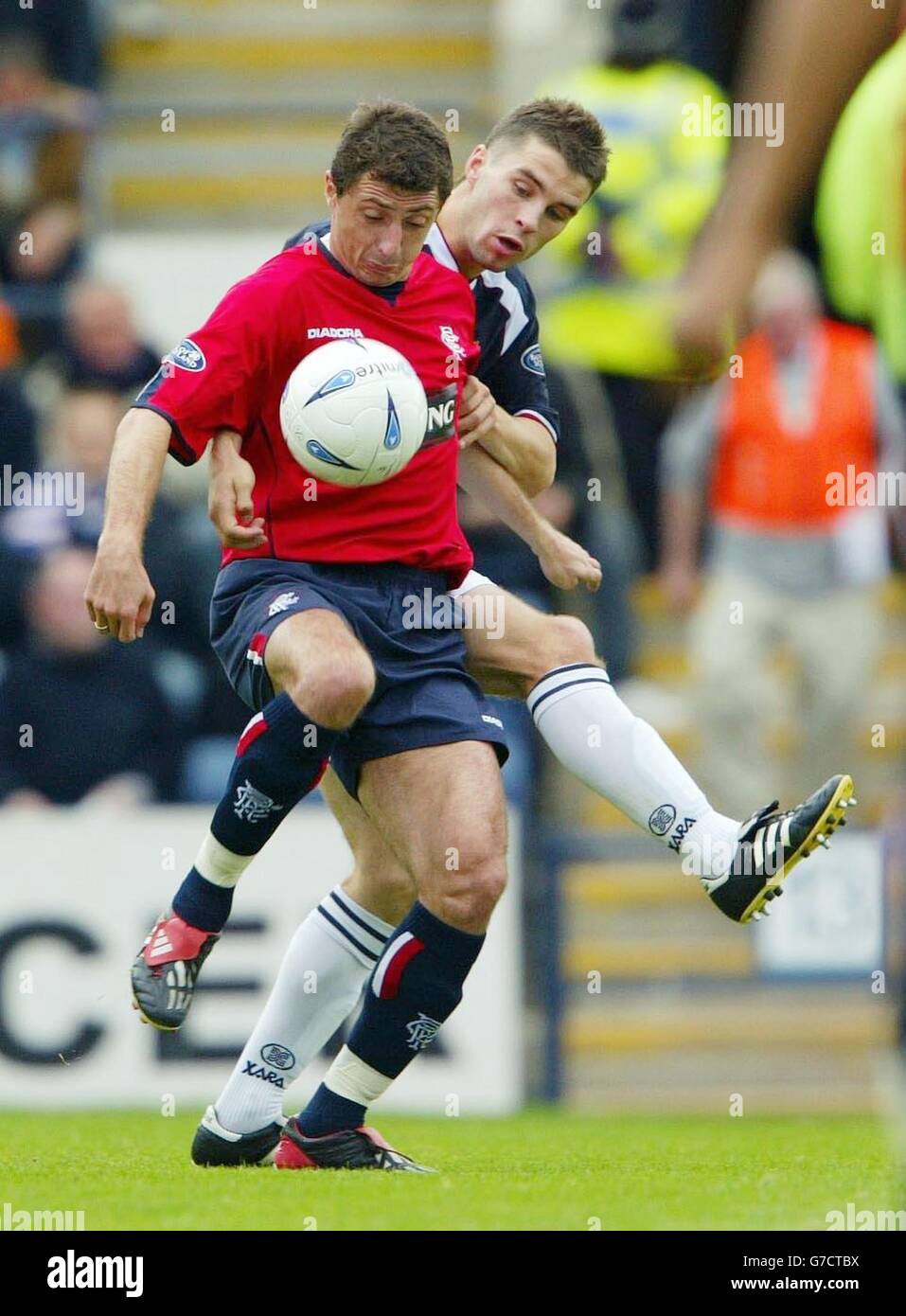Ranger's Shota Arvelladze keeping the ball away from Dundee's Callum ...
