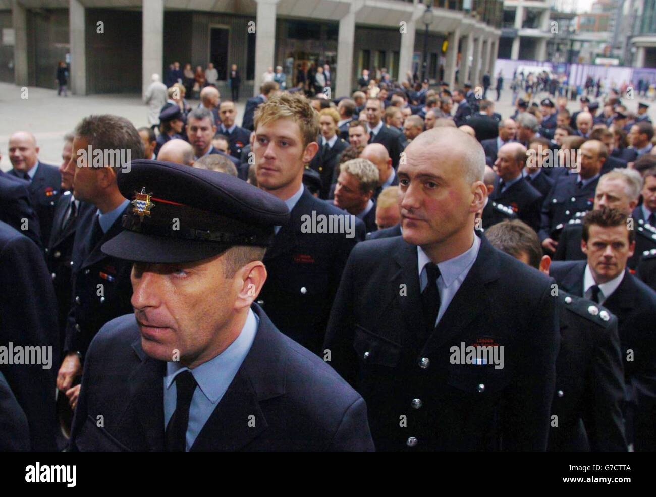 A memorial service for firefighters Bill Faust and Adam Meere inside Westminster Cathedral in central London. Around 3,000 mourners, gathered to commemorate the lives of the two men. Bill, 36, and Adam, 27, died while fighting a fire in Bethnal Green on July 20, from which two members of the public were rescued. Stock Photo