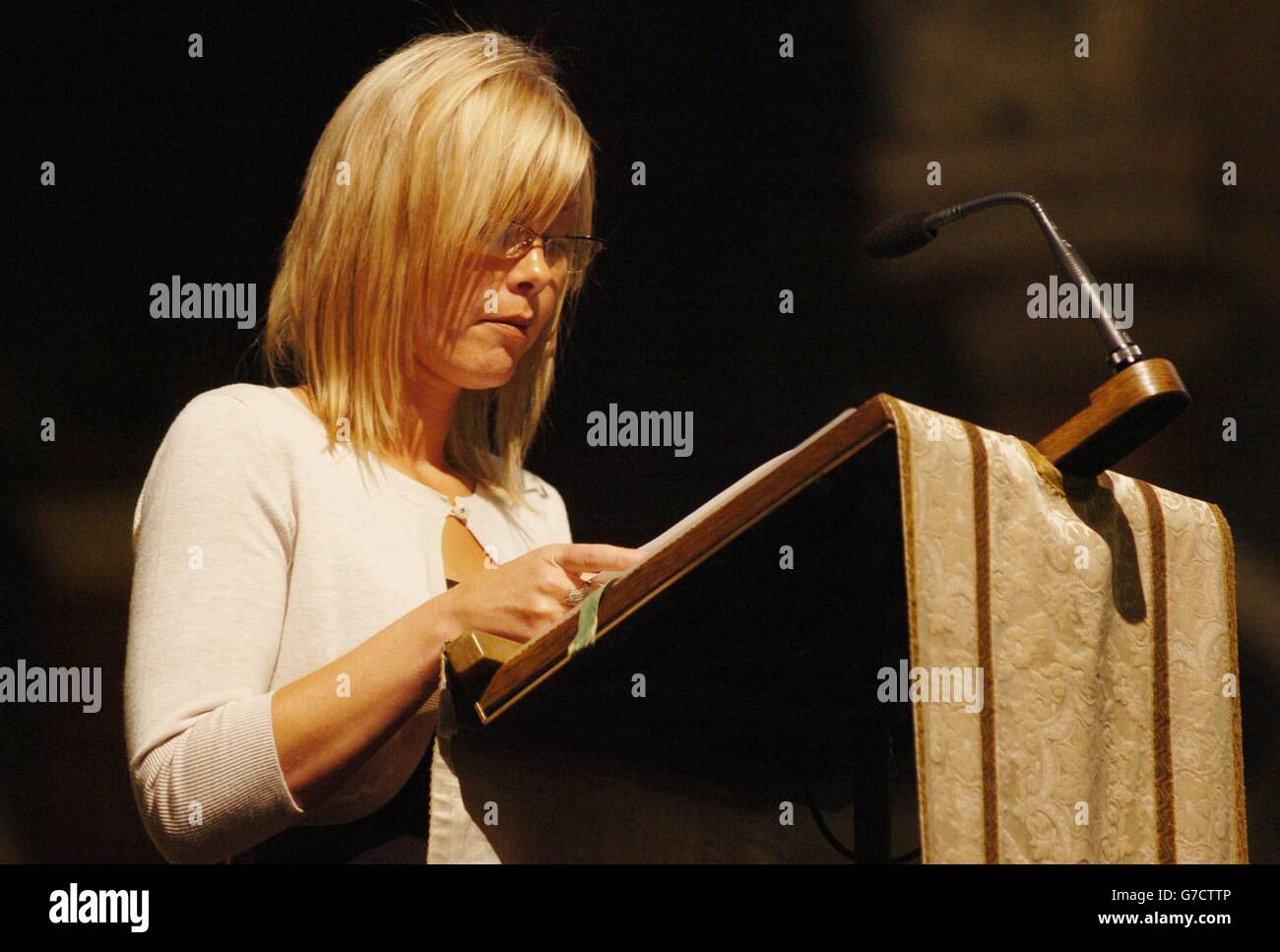 Michelle Faust pays tribute to her husband during a memorial service for him and another firefighter, Adam Meere, inside Westminster Cathedral in central London. Around 3,000 people gathered to commemorate the lives of the two men, Bill, 36, and Adam, 27, who died July 20 while fighting a fire in Bethnal Green from which two members of the public were rescued. Stock Photo