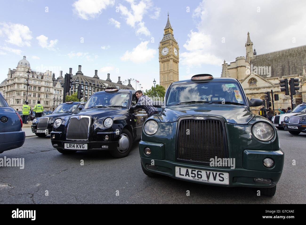 London taxi drivers block block Parliament Square during a slow driving ...