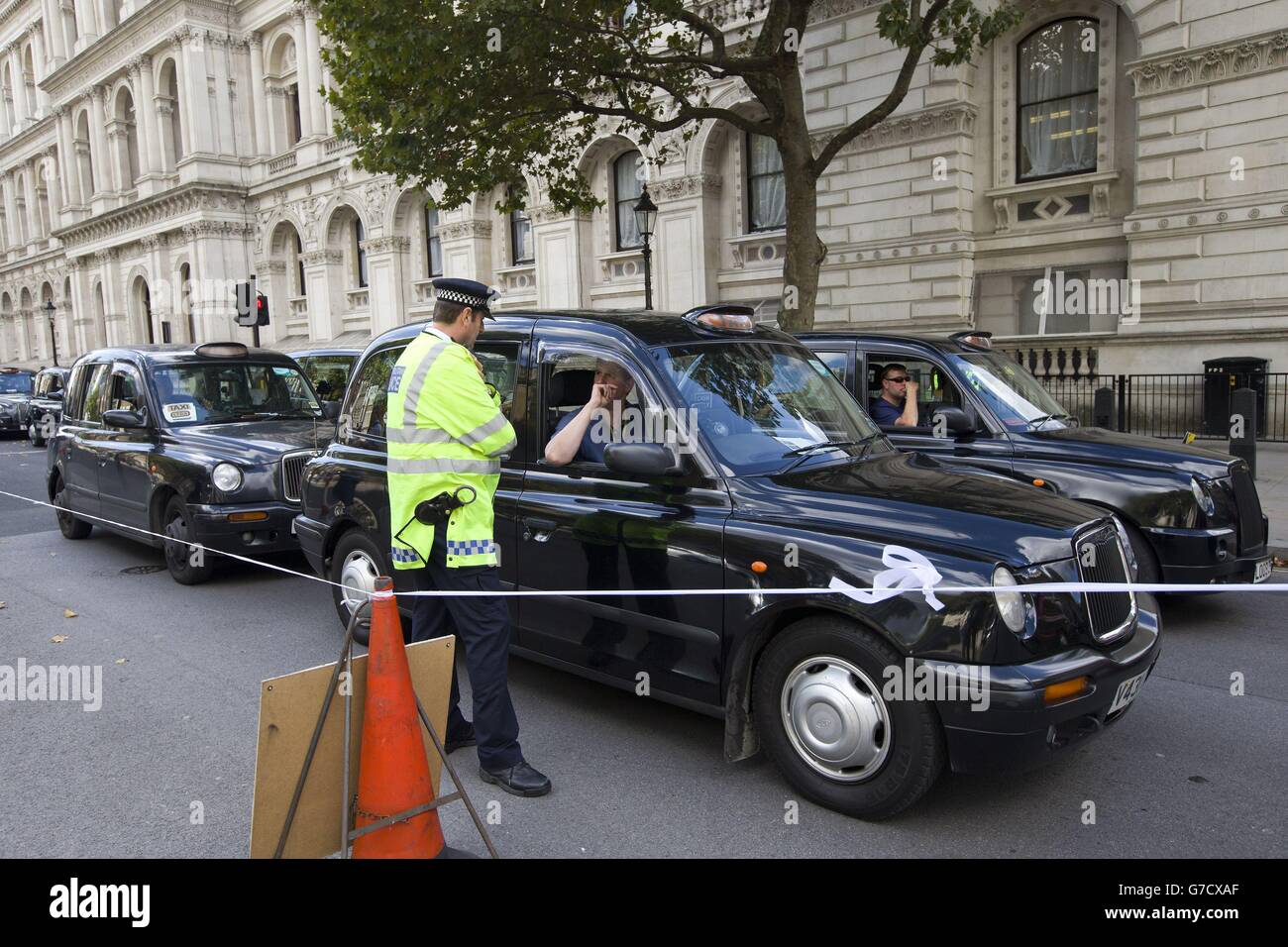 London taxi drivers block Whitehall during a slow driving protest in ...