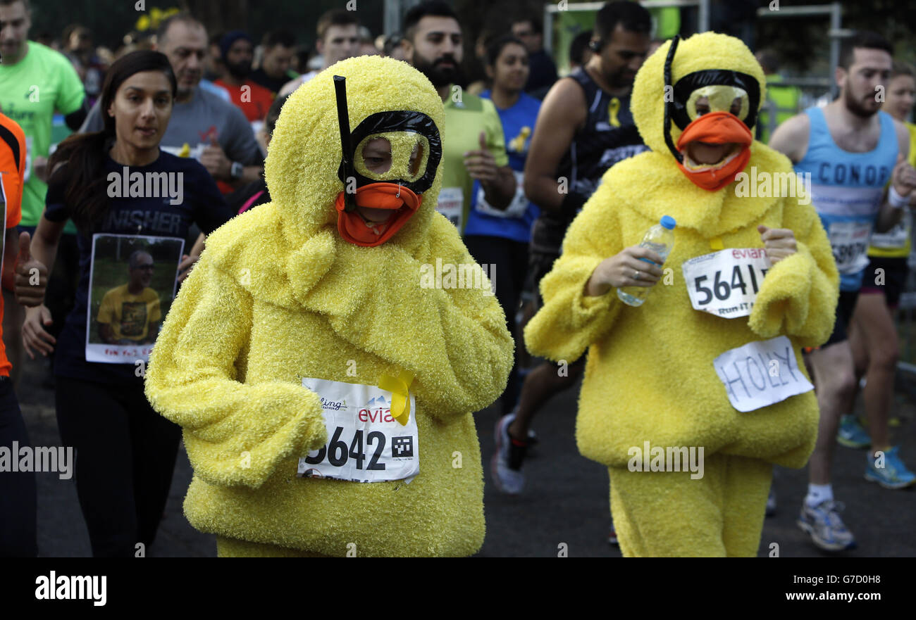 Runners in the Ealing half marathon wear yellow ribbons for missing ...