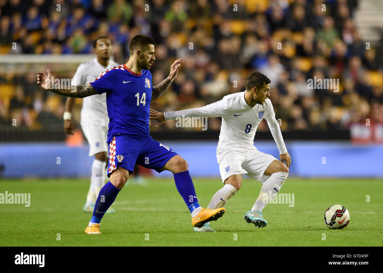 England's Jake Forster-Caskey (right) and Croatia's Marko Livaja (left) battle for the ball during the UEFA Euro Under 21 2015 Qualifying Play-Off match at Molineux, Wolverhampton. Stock Photo