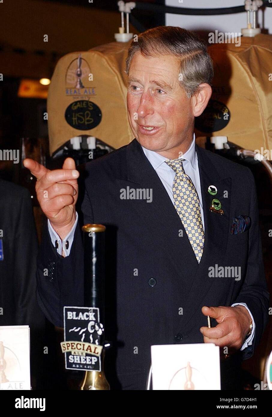 The Prince of Wales, reacts as he arrives at the Real Ale Society's stand at the Lingotto complex in Turin, Italy. during a visit to the 'Salone Del Gusto' food festival. Stock Photo