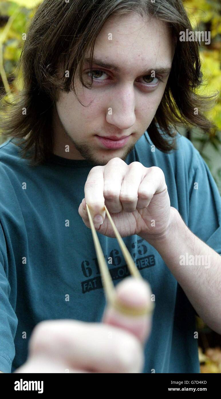 17 year old student Alex Way from Portsmouth in Hampshire who was fined 50 for flicking an elastic band in the street. Way flicked the band at a friend on his way home from college and was stopped by a council litter warden who issued him a fixed penalty notice. Stock Photo