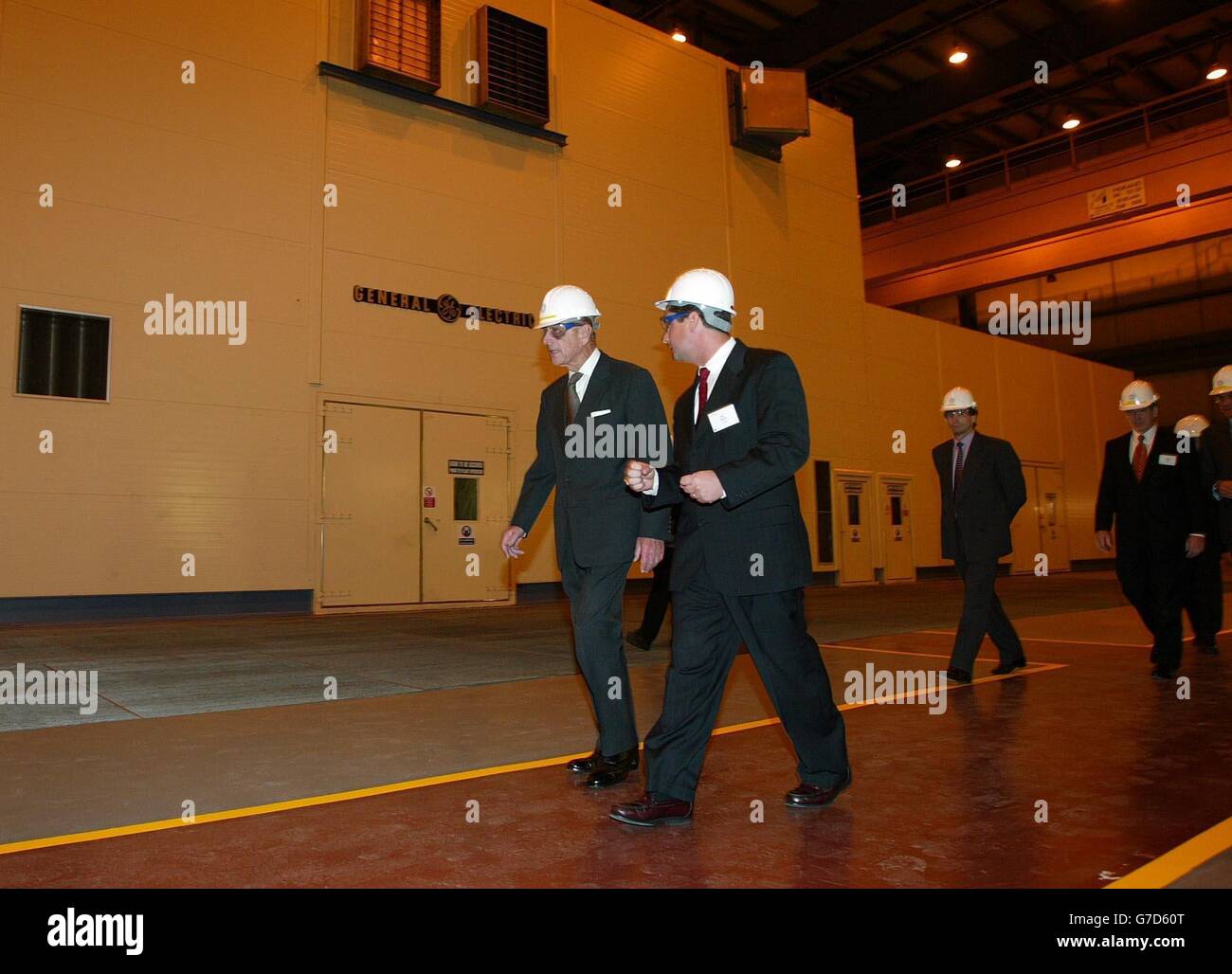The Duke of Edinburgh (left) tours the new Baglan Power Station in Port Talbot, South Wales. The American GE plant is reputed to be the most efficient gas turbine system in the world. Stock Photo