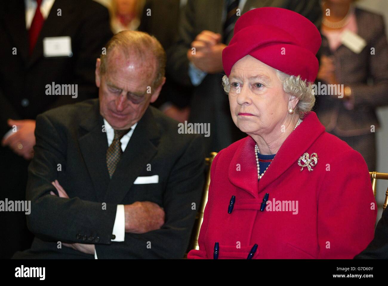 Her Majesty The Queen and the Duke of Edinburgh listen to a presentation on energy production during a tour of the new Baglan Power Station in Port Talbot, South Wales. The American GE plant is reputed to be the most efficient gas turbine system in the world. Stock Photo