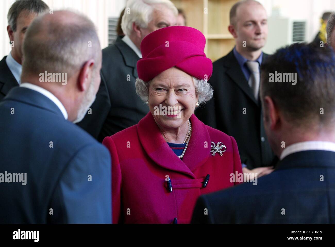 Her Majesty the Queen meets staff of General Electric Energy as she tours the new Baglan Power Station in Port Talbot, South Wales. The American GE plant is reputed to be the most efficient gas turbine system in the world. Stock Photo