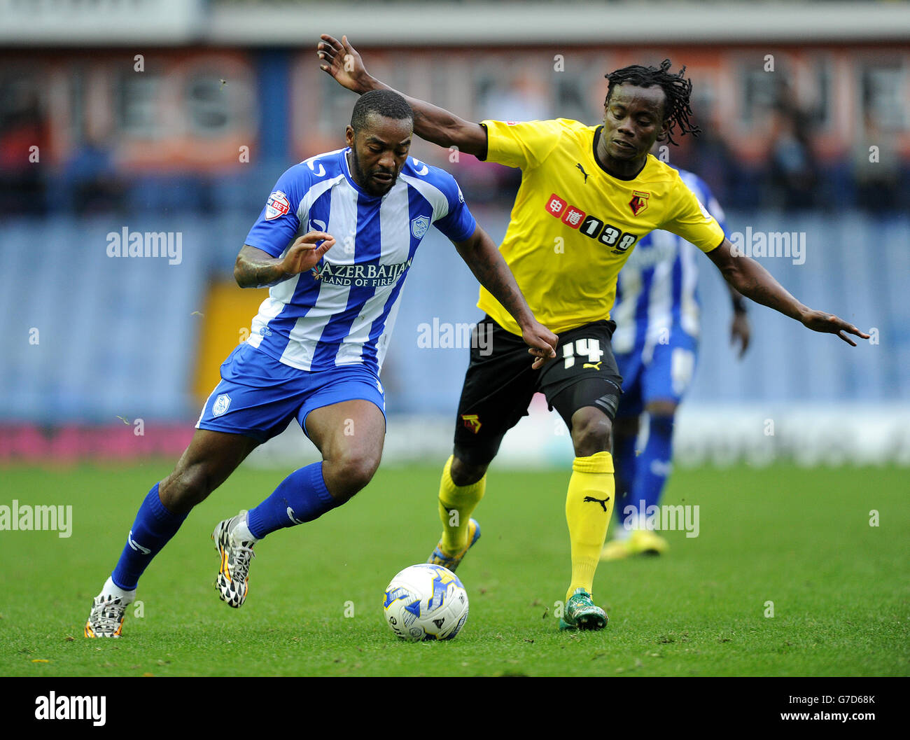 Sheffield Wednesday's Jacques Maghoma (left) and Watford's Juan Carlos Paredes in action Stock Photo