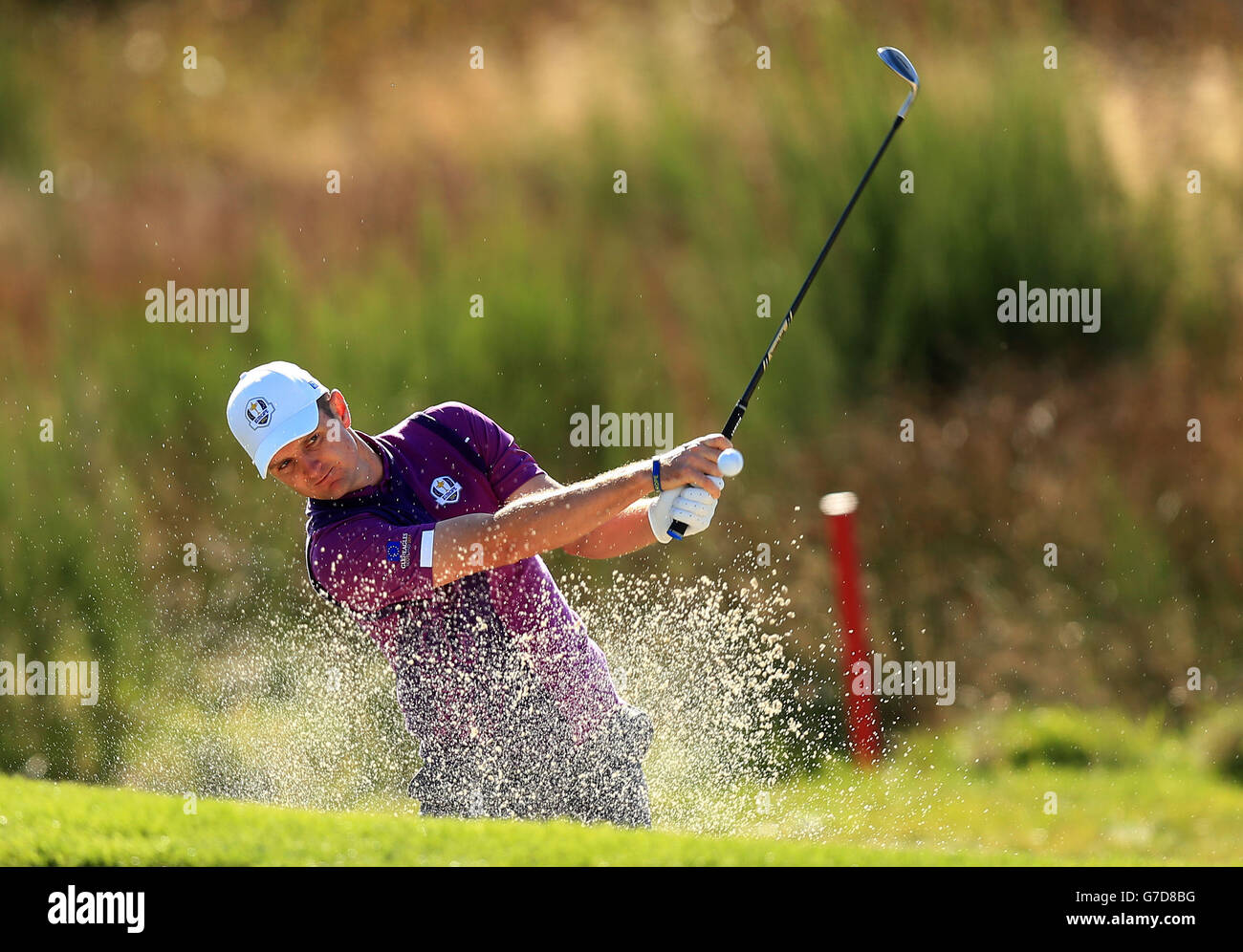 Europe's Justin Rose chips out of a bunker during a practice session at Gleneagles Golf Course, Perthshire. Stock Photo