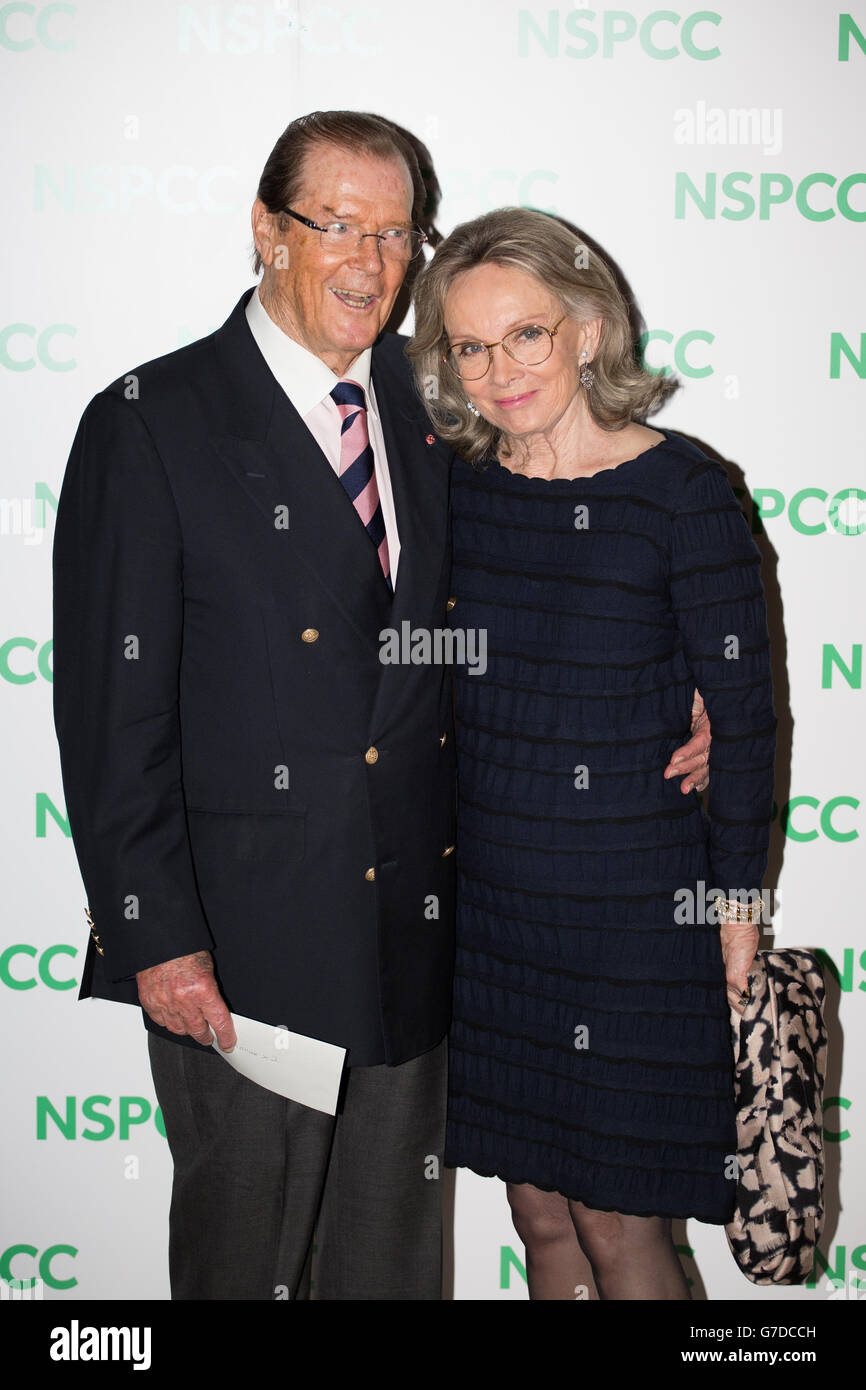 Roger Moore and his wife Kristina Tholstrup arriving at the Royal Albert Hall for a special event looking back at the career of Sir Michael Caine where clips will be played on stage and music from his best-known films played live by the London Symphony Orchestra in aid of charity, NSPCC. Stock Photo