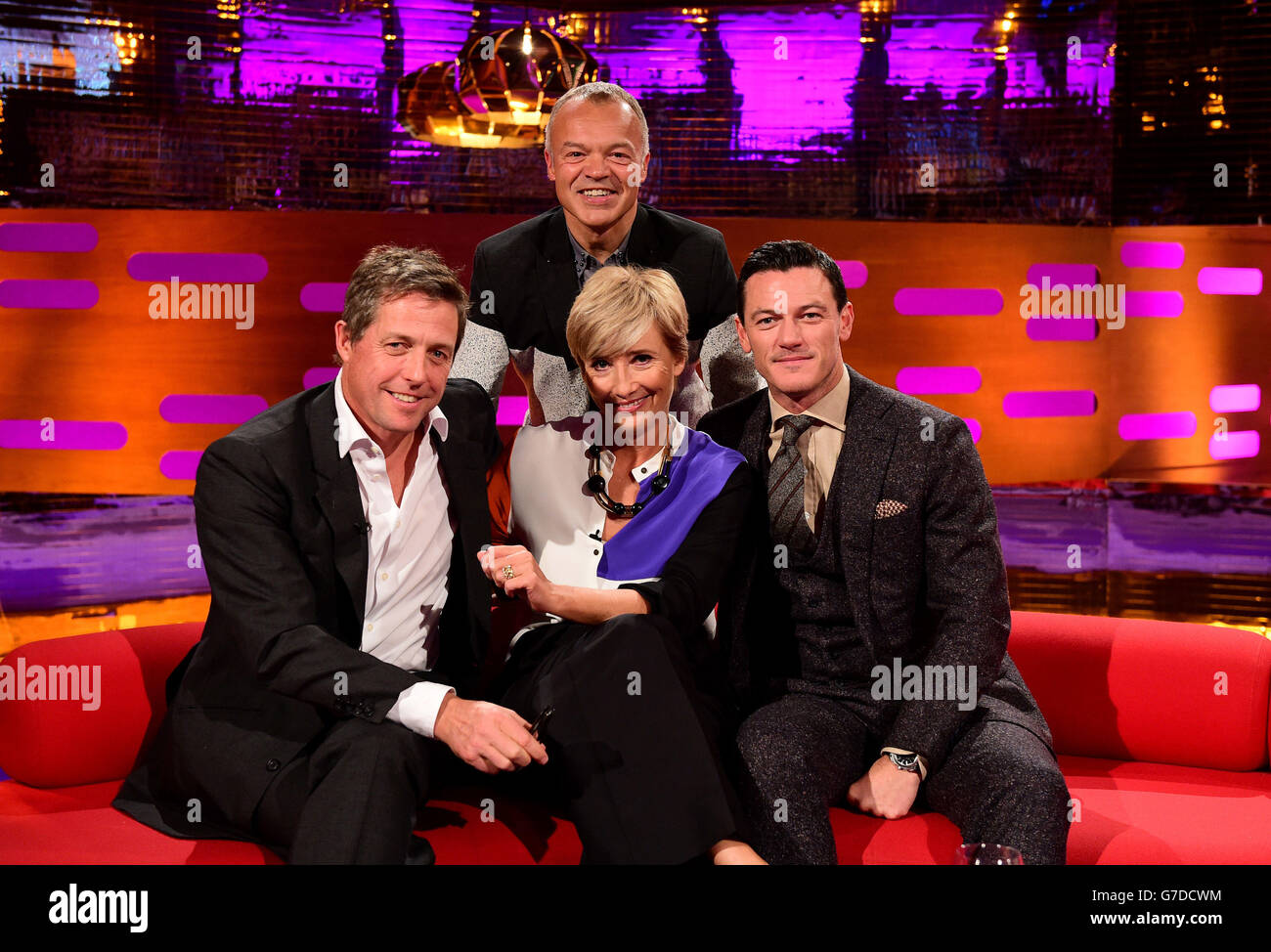 Presenter Graham Norton (centre back) with (leftright) Hugh Grant