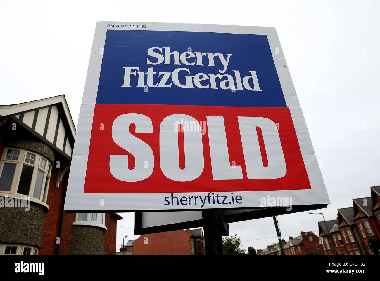 A sold sign outside a house in Dublin as Ireland's hard-pressed taxpayers are set for the first easing of austerity in seven years when tax cuts are announced in today's payback budget. Stock Photo