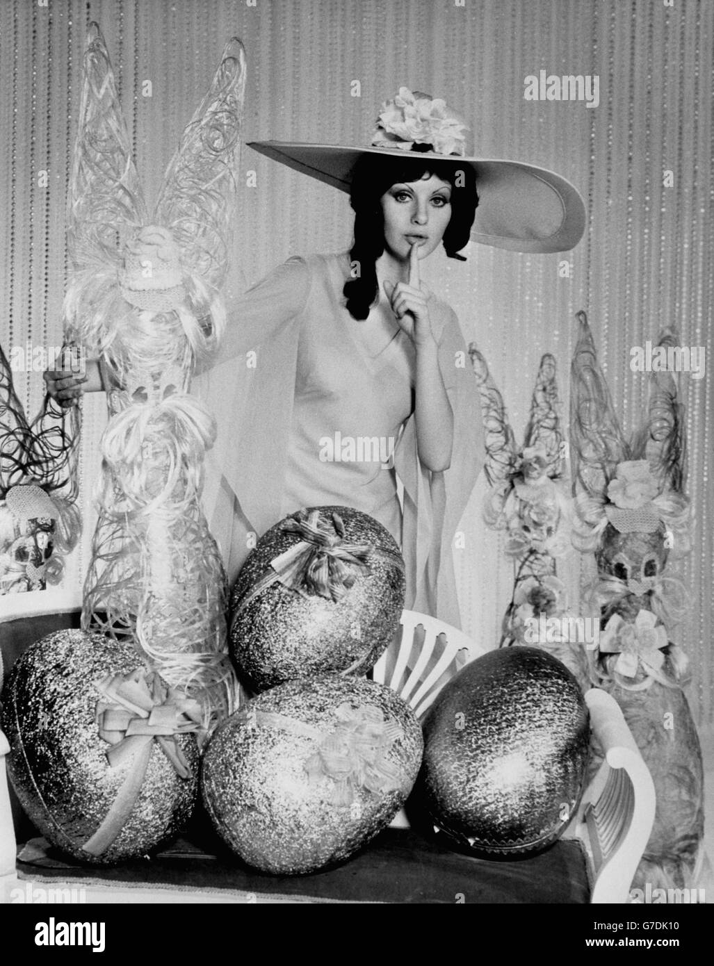 Intent on wishing filmgoers an old fashioned Easter is 21-year-old Valli Kemp, 'Miss Australia, 1970', who makes her film debut as Vincent Price's leading lady in 'Dr Phibes Rises Again'. Valli, donned in draperies and a picture hat, to pose alongside giant Easter eggs and bunnies. Stock Photo