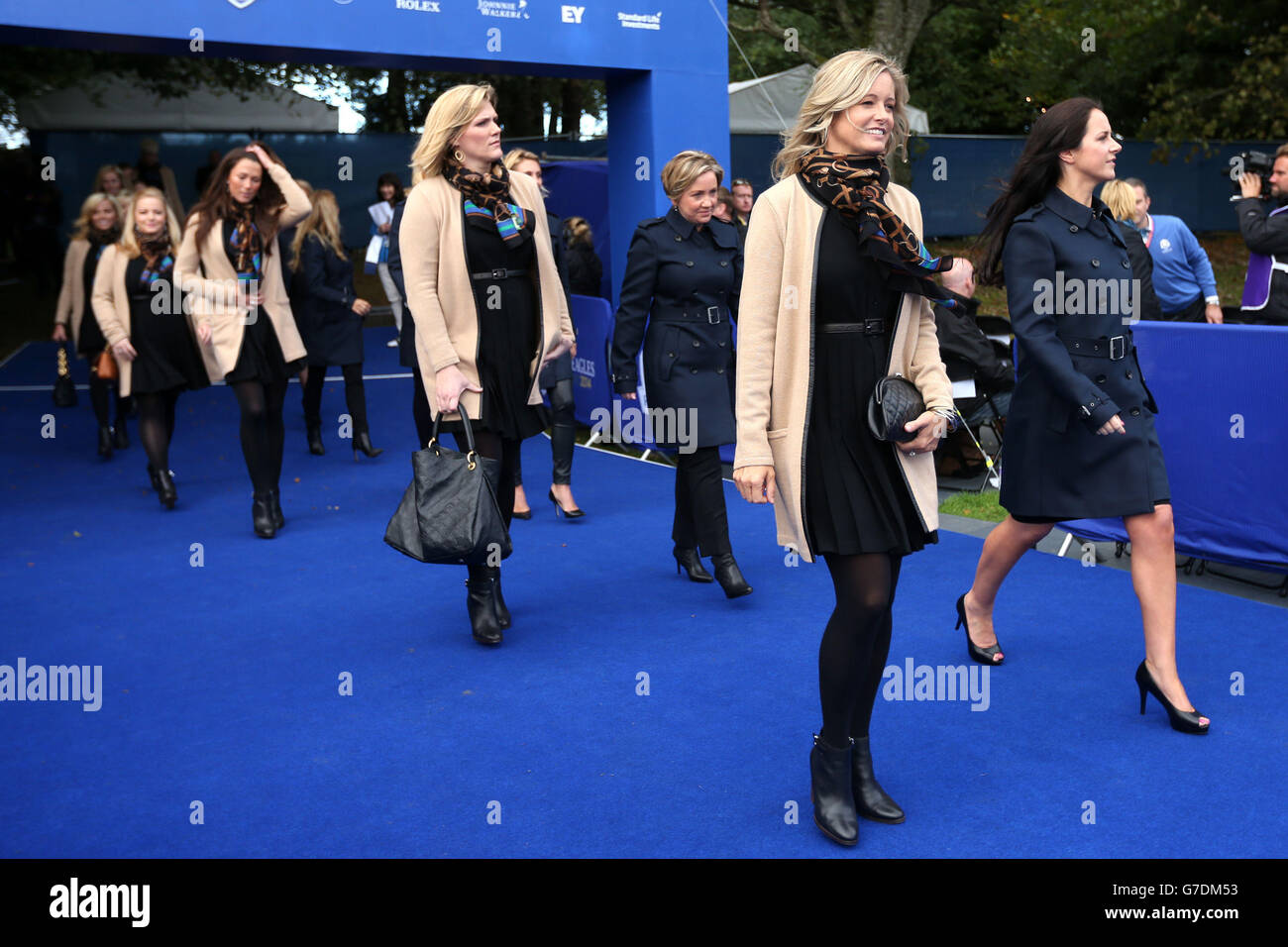 Dowd Simpson and Kathryn Tagg (right) fiancee of Jamie Donaldson arrive for the opening ceremony of the 40th Ryder Cup at Gleneagles Golf Course, Perthshire. Stock Photo