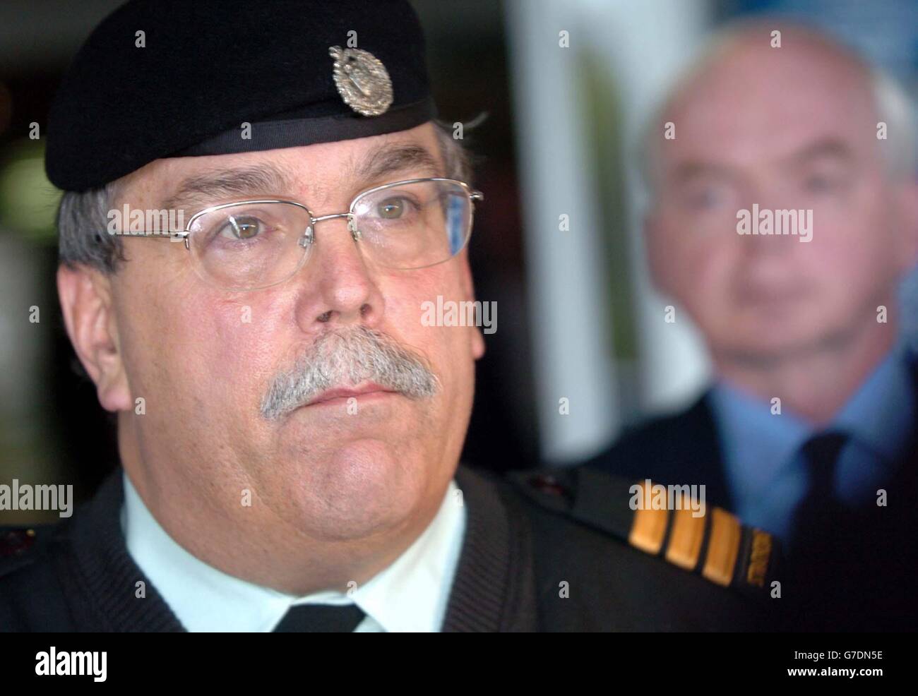 (L-R) Military attache to the Canadian Embassy in Ireland, Lieutenant Colonel Moffet and Canadian Ambassador to Ireland, Mark Moher, speaking to journalists outside Sligo General Hospital, after visiting two casualties airlifted from the striken Canadian submarine HMCS Chicoutimi. The Canadian submarine suffered a fire on board two days ago and had been drifting without power off the North West Coast of Ireland before Irish and British Naval vessels converged on the scene and commenced a resue operation. Stock Photo