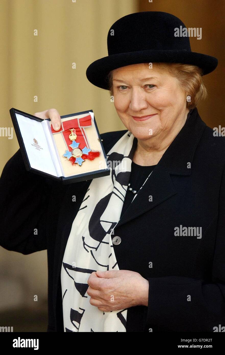 Actress Patricia Routledge who played TV's shameless social climber Hyacinth Bucket - pronounced Bouquet - at Buckingham Palace, London, after being presented with an MBE by Britain's Queen Elizabeth II. Stock Photo