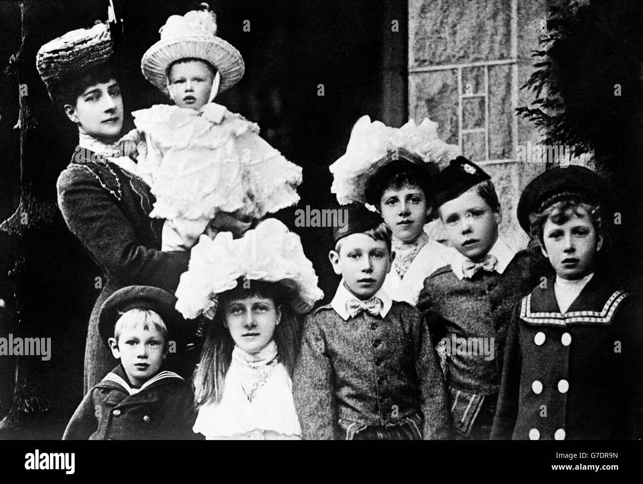 Queen Alexandra with seven of her grandchildren. c1904. Stock Photo