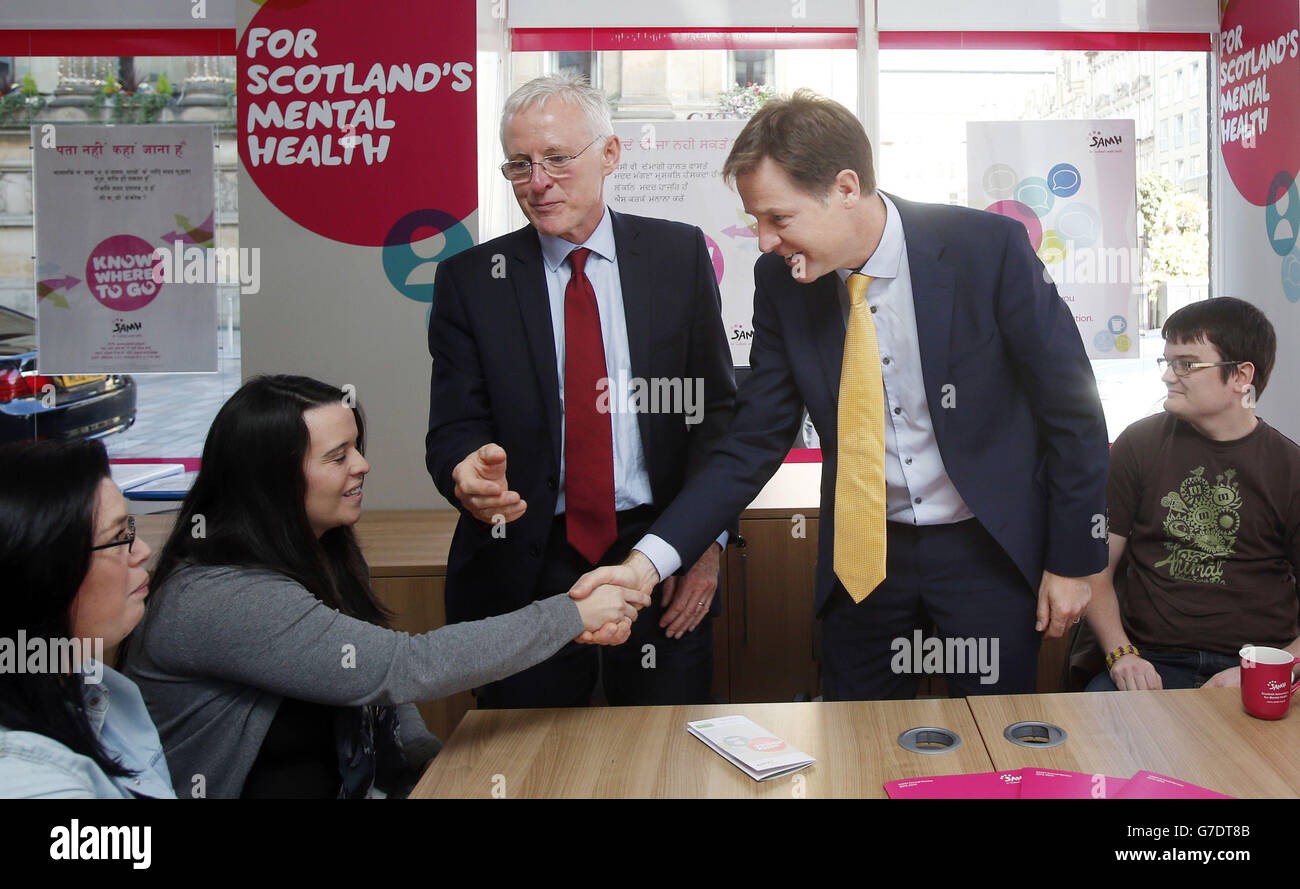 Deputy Prime Nick Clegg and Health Minister Norman Lamb during a visit to the Scottish Association for Mental Health in Glasgow on day four of Liberal Democrat autumn conference in Glasgow, Scotland. Stock Photo