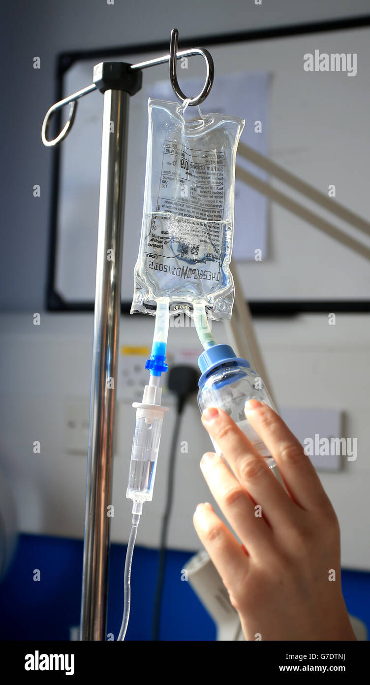 A nurse checks a drip at the Royal Liverpool University Hospital, Liverpool. Stock Photo