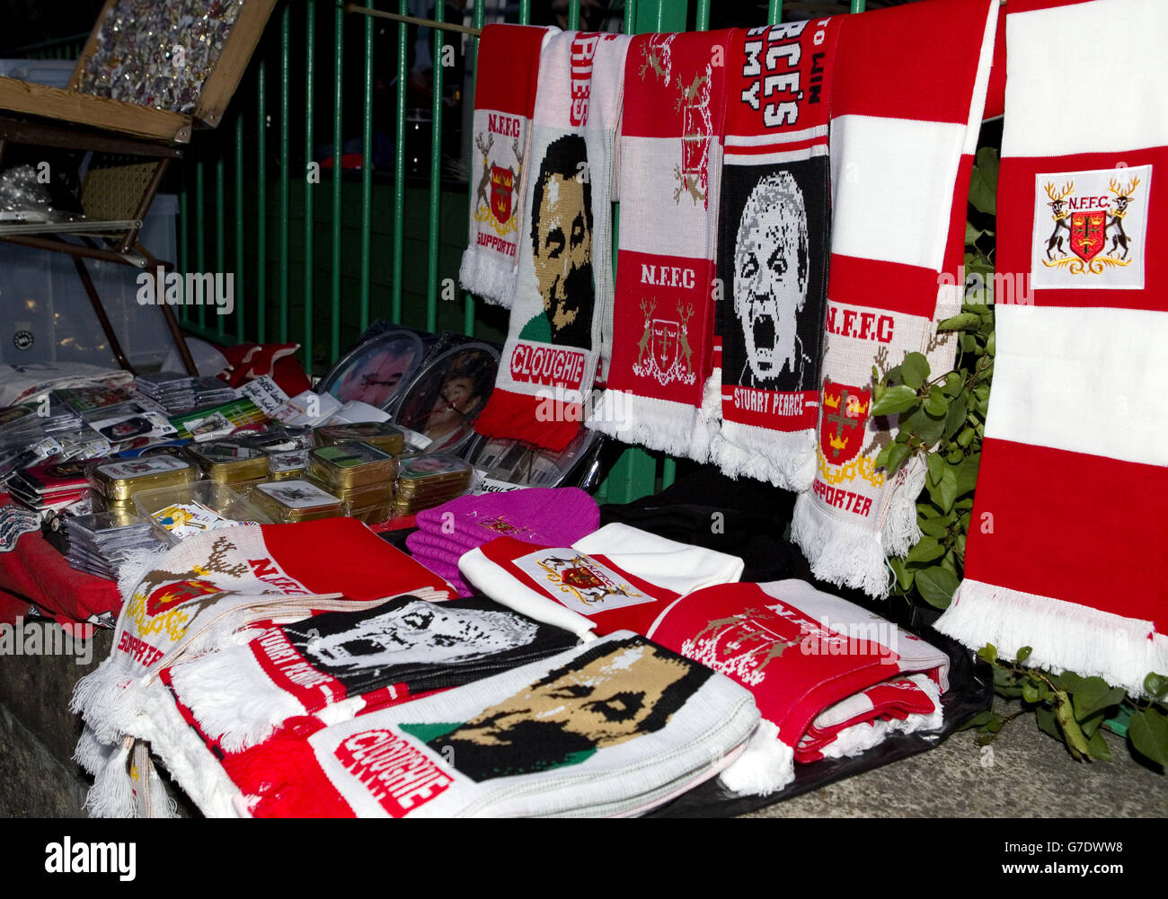 Scarves on sale outside the ground depict former manger Brian Clough and current manager Stuart Pearce Stock Photo