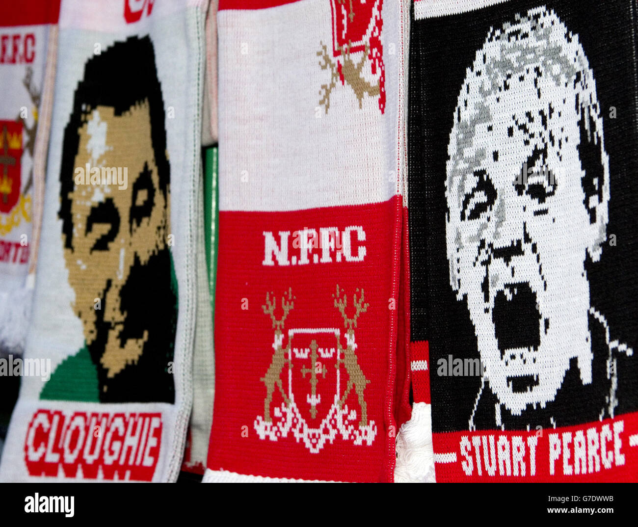 Scarves on sale outside the ground depict former manger Brian Clough (left) and current manager Stuart Pearce Stock Photo