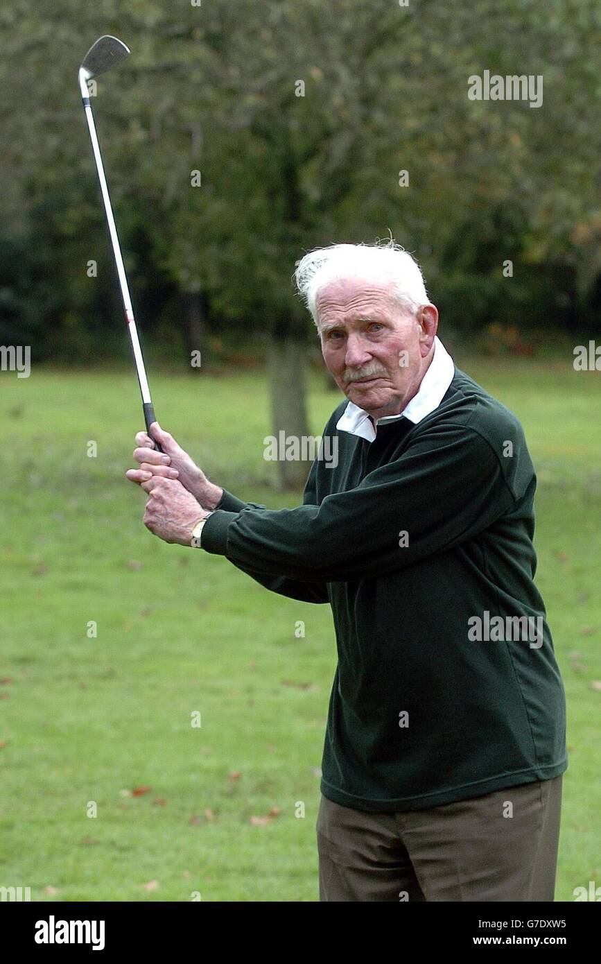 Mr Geoffrey Goronwy-Owen. Mr Geoffrey Goronwy-Owen with his golf clubs at his home in Denham. Stock Photo