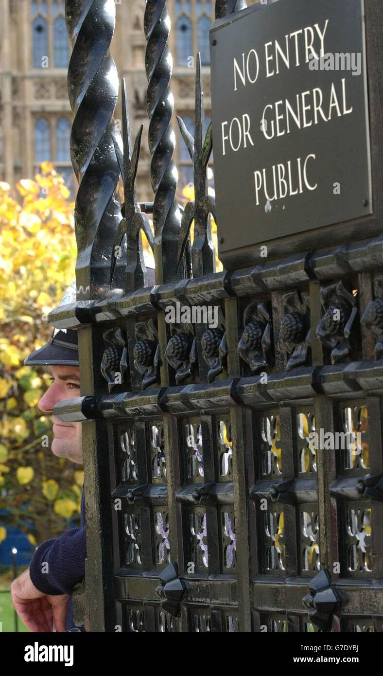 A Policeman keeps a watchful eye the Houses of Parliament in central London. Under new security proposals, the immediate area around Parliament Sqaure will be closed off to the public, in a bid to deter potential terrorist strikes against the British legislature. Stock Photo