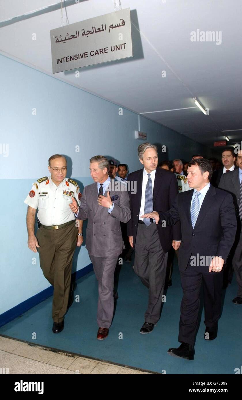 Left to right: Royal Medical Services of Jordan Surgeon General Dr Manaf Hijazi, The Prince of Wales, British Ambassador to Jordan Christopher Prentice and Jordan's King Abdullah arrive at the Intensive Care Unit of the King Hussain Medical Centre in Amman, Jordan, to visit injured passengers following a coach crash involving British and Jordanian citizens near Petra earlier today. Stock Photo