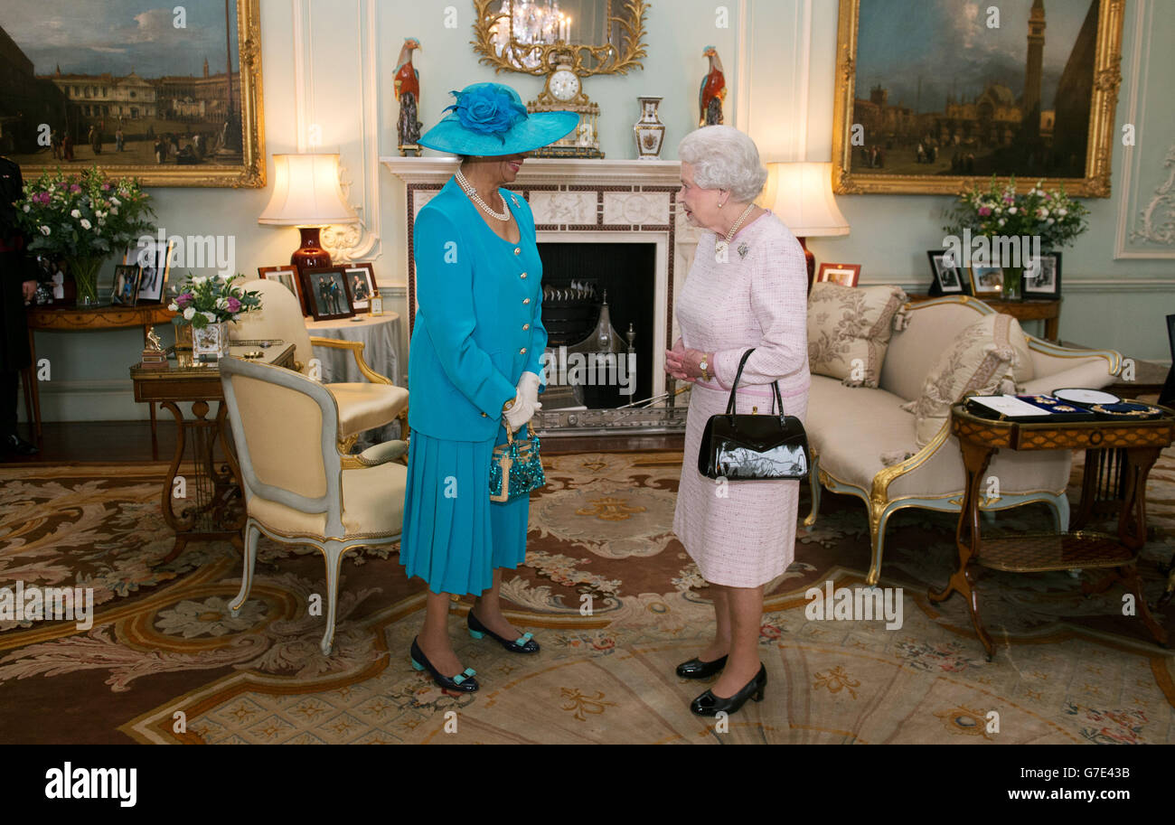 Queen Elizabeth II holds an audience with Dame Marguerite Pindling upon ...