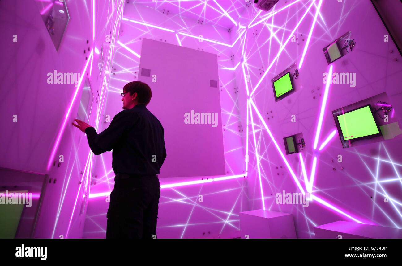 A technician checks the Web story box display at the Information Age gallery at the Science Museum in central London which is a new gallery dedicated to the history of information and communication. Stock Photo