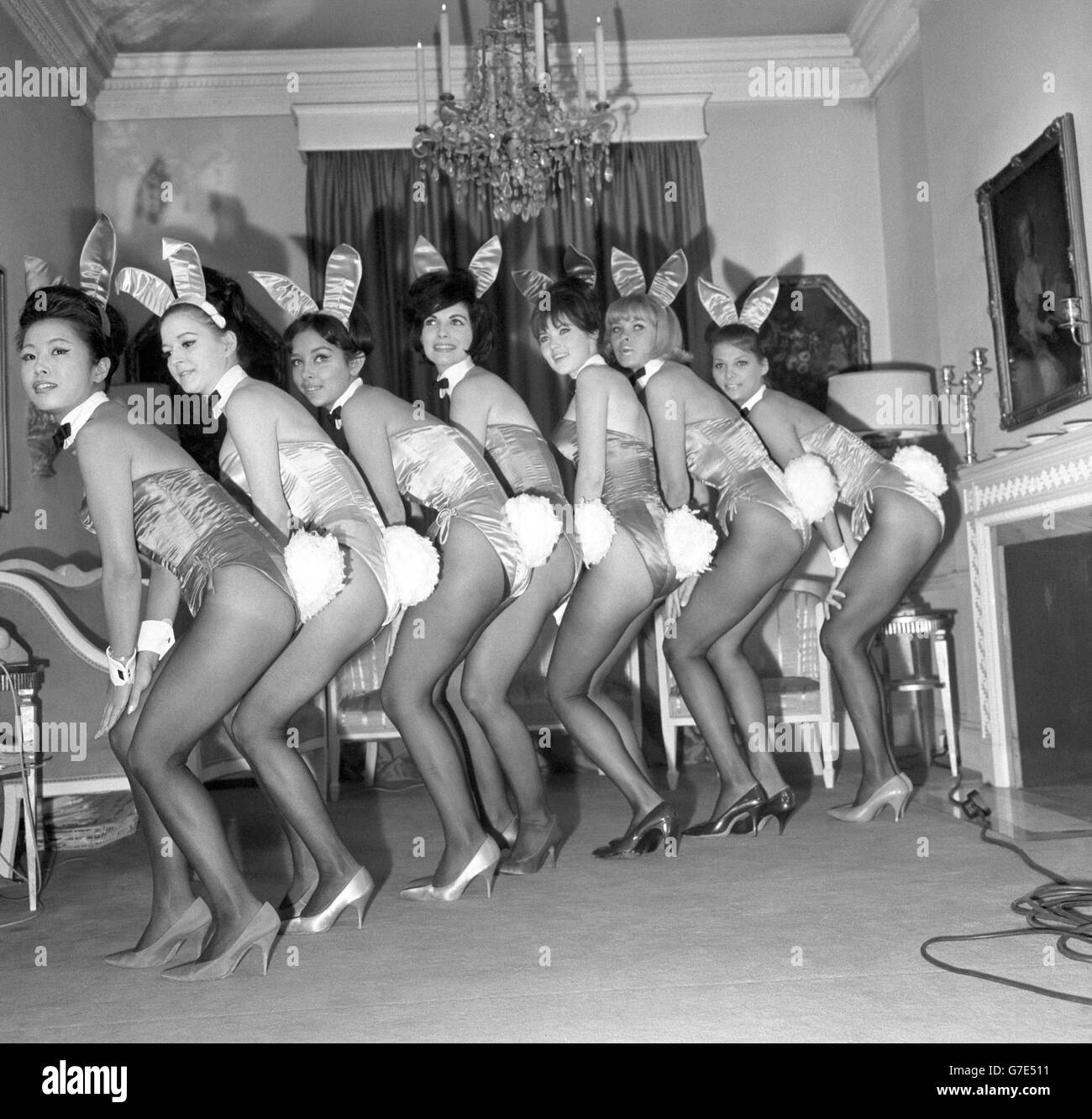 Seven winners of the 'Bunny Award' pose for pictures in London following a visit to Paris. They were chosen from America's Playboy Clubs for their appearance, graciousness and popularity. (l-r) Elizabeth Yee from New York, Penny Payton from Chicago, Katherine Fitzpatrick from Detroit, Martha Louise Hellwig from New Orleans, Doris Karloss from Phoenix, Iris Niedra from Miami and Joyce Chadwick from St. Louis. Stock Photo