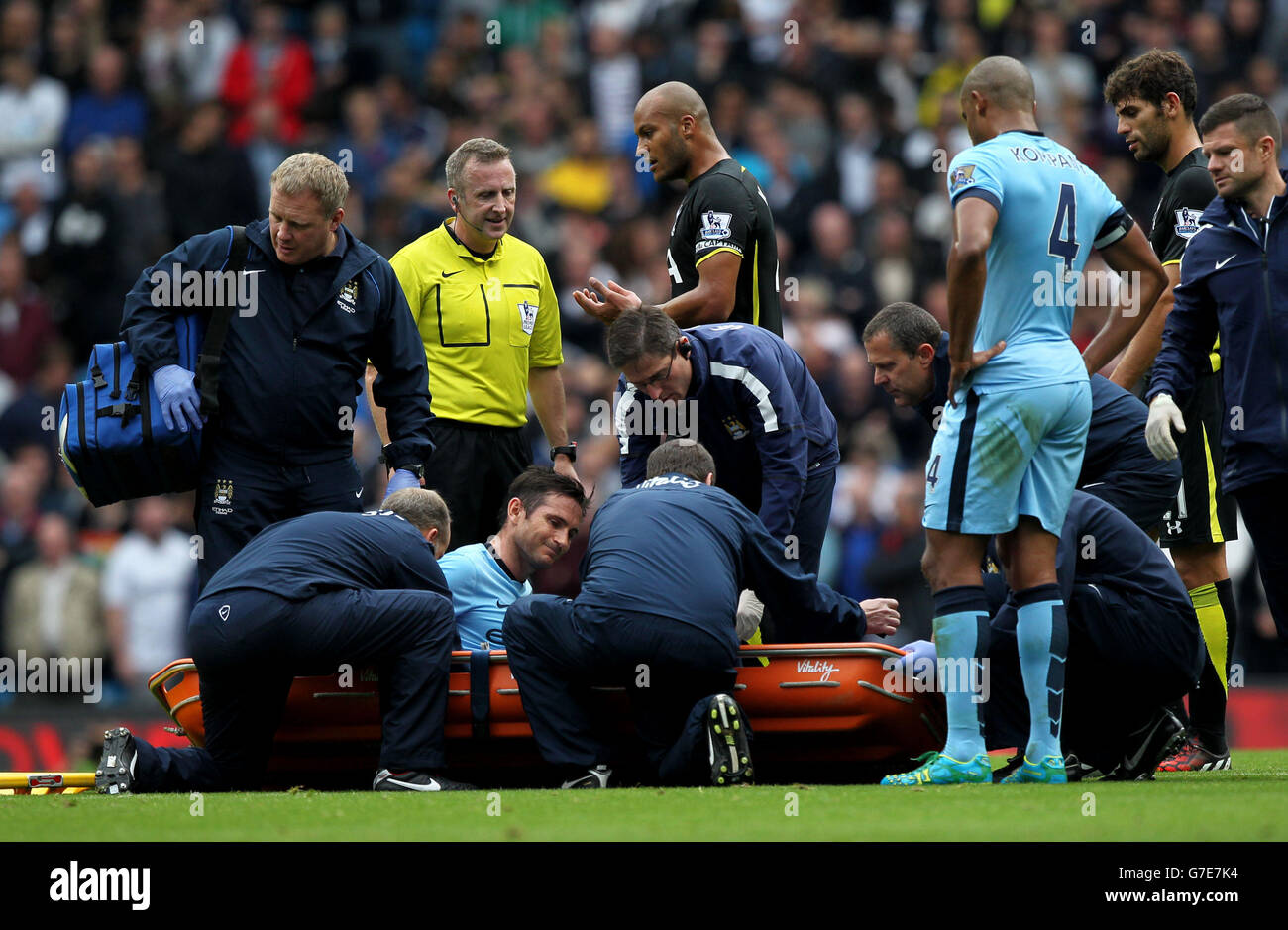 Manchester City's Frank Lampard receives treatment during the Barclays Premier League match at the Etihad Stadium, Manchester. Stock Photo