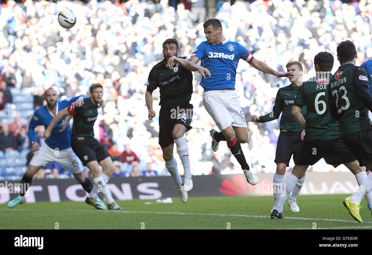 Rangers captain Lee McCulloch heads home the first goal during the SPFL Championship match at Ibrox Stadium, Glasgow. Stock Photo