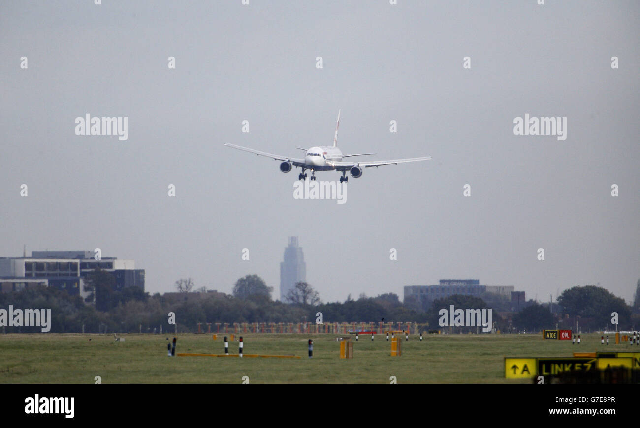 Planes land in the strong winds at Heathrow Airport, as the remnants of ...