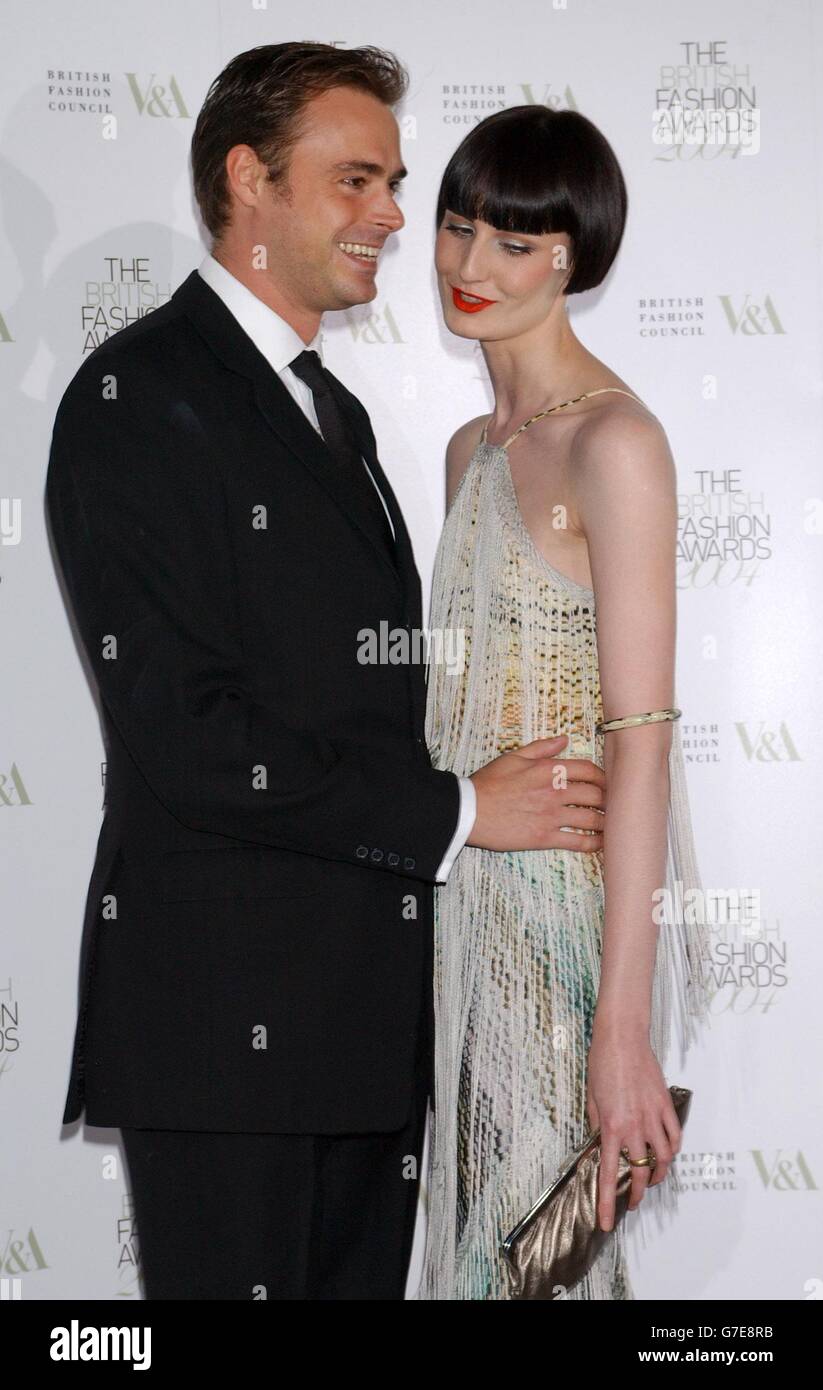 Model Erin O'Connor and Jamie Theakston arrive for the British Fashion Awards at the Victoria and Albert Museum in central London. The event, run by the British Fashion Council, promotes the creativity and international influence of British fashion design. Stock Photo