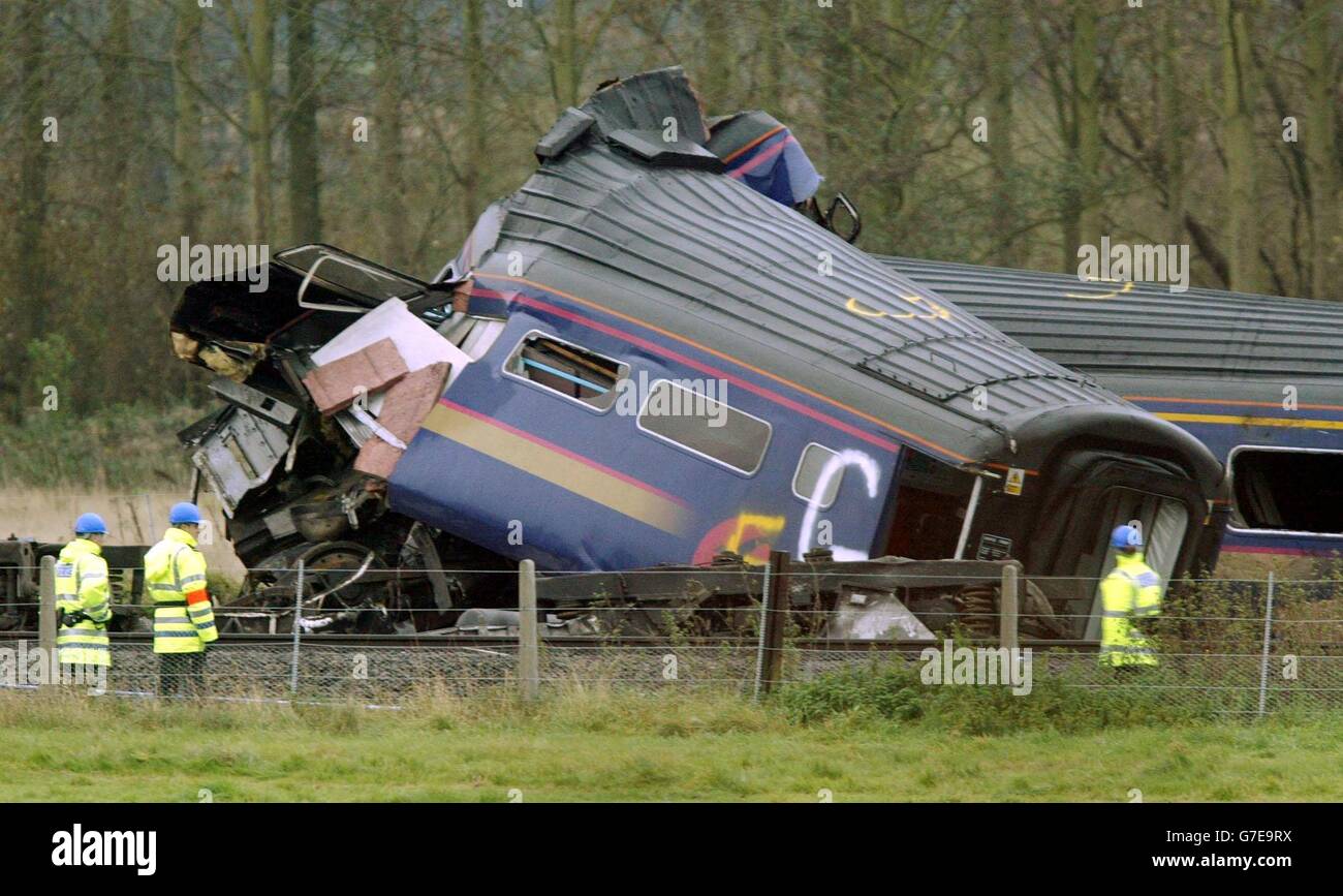 One of the carriages, of the train which hit a saloon car Saturday on a remote level crossing near Ufton Nervet in Berkshire. Six people died in the impact and a seventh died in hospital Sunday. Police investigating the incident are focusing on why a motorist parked his car in the path of the train. All the bodies have now been removed from the site and a crane is being constructed to begin clearing the wreckage. Stock Photo