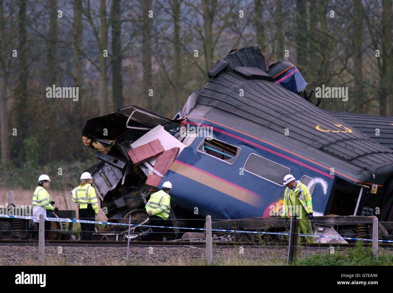 The mangled wreckage of one of the carriages of the train, which hit a saloon car on a remote level crossing near Ufton Nervet in Berkshire. Six people died in the impact and a seventh died in hospital. Police investigating the incident are focusing on why a motorist parked his car in the path of the train. All the bodies have now been removed from the site and a crane is being constructed to begin clearing the wreckage. Stock Photo